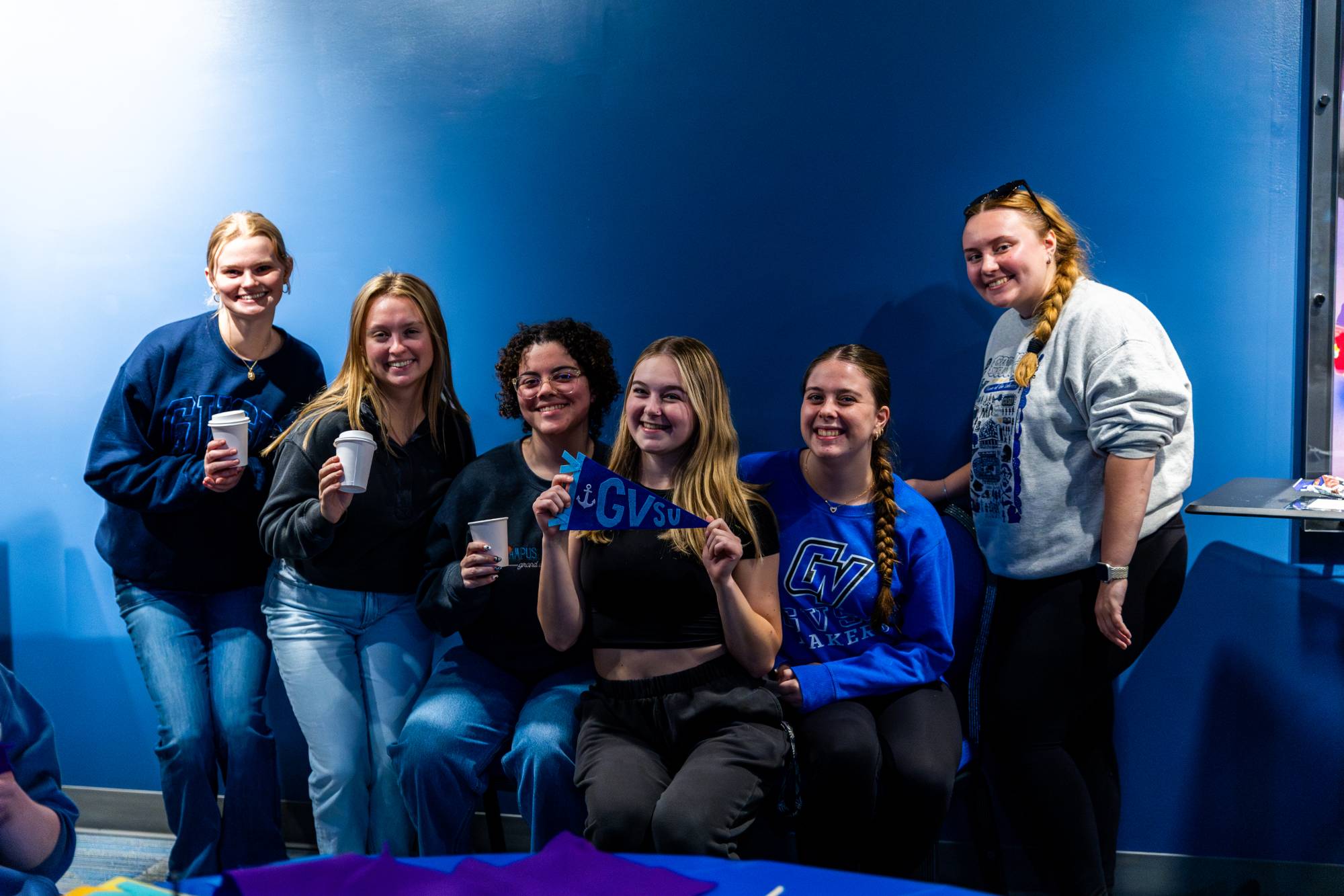 students sitting on couch